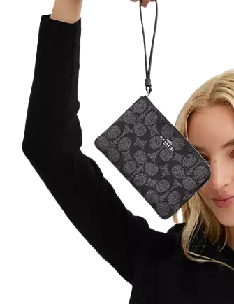 Coach Corner Zip Wristlet In Signature Canvas