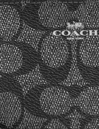 Coach Corner Zip Wristlet In Signature Canvas