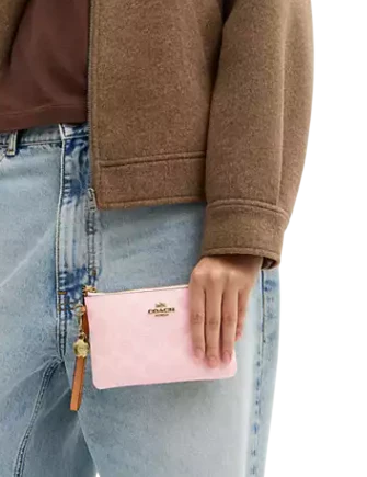 Coach Corner Zip Wristlet In Signature Canvas With Charms