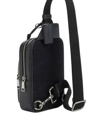 Coach Racer Sling Pack In Signature Canvas With Charms