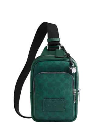 Coach Racer Sling Pack In Signature Canvas With Charms